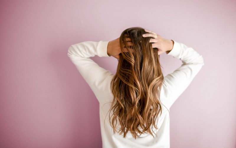 woman-wearing-white-long-sleeved-shirt-973401